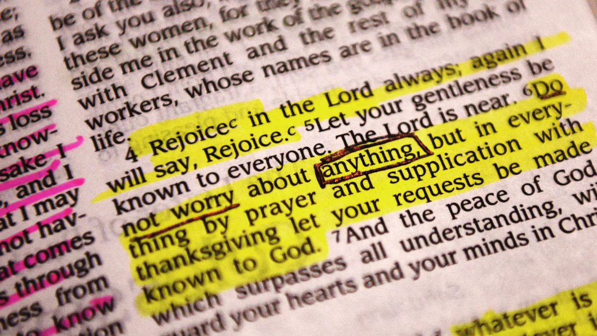 A Bible passage highlighted in yellow and pink for cross-referencing